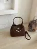 Bolso de mano sencillo de nicho estilo coreano transfronterizo para mujer, nuevo de 2026, versátil, elegante, para hombro y cruzado