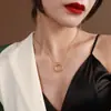 ¡Privado! Collar Colgante Anillo Cruzado Círculo Estilo Frío Simple Cadena Clavícula Joyería Chapada en Oro de Acero de Titanio
