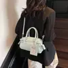 Bolsos Transfronterizos Bolsos de Diseño de Nicho 2025 Nuevo Bolso Cuadrado Pequeño Simple Bolso de Hombro Cruzado Moda de Primavera