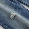 Jeans Rectos Ajustados Rasgados para Hombre Europeos y Americanos 2017 Mismo Estilo que Beckham Pantalones con Botón Talla Grande Pantalones de Moda