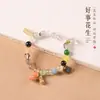 Pulsera de Cuentas Multi-tesoro de Cristal para Mujer Dios de la Riqueza Nueva Cadena de Mano China Wenwan Estilo Nacional Retro Adorno de Mano Cacahuete Nicho Venta al por Mayor