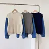Suéter de patchwork de mezclilla, un diseño de dos piezas simulado para mujer, otoño/invierno 2026, estilo nuevo, top de punto holgado