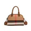 Bolso con Estampado de Rayas para Mujer 2026 Nuevo Estilo de Lujo Ligero Versátil para Viajar al Trabajo Bolso de Hombro Cruzado Transfronterizo