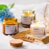 Frascos de vela personalizados con tapones de madera marrón, tazas de vela perfumada de vidrio mini de 200 ml al por mayor en stock, frascos de Biblia para DIY