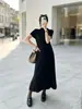 Vestido largo de punto estilo coreano con cuello semi-alto para mujer, nuevo diseño de principios de otoño 2026, de manga corta, a la moda, con falda amplia de línea A