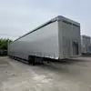 Reboque de Transporte Logístico de 5 Eixos Transfronteiriço, Semirreboque Tipo Baú com Ponte Elevatória a Ar, Caminhão com Laterais de Cortina de Grande Canal de 120 Metros Cúbicos
