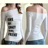 Ropa Y2K para mujer, camiseta de manga larga dulce y picante estilo americano con estampado de letras, hombros descubiertos, casual, versátil, sexy, estilo trendy de Instagram