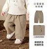 Nuevos pantalones de primavera y otoño para niños y niñas, pantalones casuales bordados de dibujos animados estilo nórdico para bebés y niños pequeños, pantalones largos elegantes y versátiles para niños