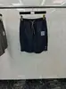 Directo de fábrica TB tendencia de verano hombres y mujeres con cuatro barras rayas reflectantes secado rápido pantalones de playa a prueba de viento protección solar