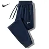 Pantalones de chándal holgados de pierna recta para hombre, talla grande, para primavera y otoño, joggers modernos con bolsillo y cremallera, pantalones casuales elegantes para hombre