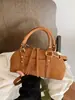 Bolso de mano, bolso tote pequeño, sensación de alta gama, versátil para ir al trabajo, bolso de hombro cruzado, nuevo bolso vintage para mujer Otoño e Invierno 2026, transfronterizo