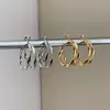 Brincos de Argola Redondos de Camada Dupla Mais Vendidos no Exterior Brincos com Design de Nicho Modernos para Mulheres Personalidade Temperamento Exagerado Sensação de Alto Padrão Ornamentos de Orelha