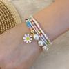 [Ice Meng] Pulsera de cuentas de arroz de moda con combinación de margaritas, joyería transfronteriza europea y americana B560