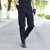 Pantalones de entrenamiento gruesos de color liso con felpa interior para invierno al por mayor, resistentes al desgaste, protección laboral, a prueba de frío, holgados, para tallas grandes, soldadura
