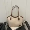 Bolsa Tote de Gran Capacidad Estilo Coreano Nicho Bolso de Hombro Casual Nuevo Primavera 2026 Bolso de Mano Retro Moderno Bolso de Hombro