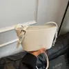 Bolsas Pequeñas Estilo Coreano Primavera/Verano 2026 Diseño de Nicho 2026 Bolso Cruzado de Hombro Único de Moda para Mujer Bolso Tipo Cubo de Diseño de Nicho