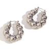 Pendientes de moda transfronteriza europea y americana, simples, de nicho, personalizados, de acero inoxidable chapado en oro de 18 quilates, con cuentas de nube huecas para mujer