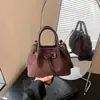 Bolso de diseño único para mujer, nuevo bolso cubo retro estilo coreano de ante, elegante bolso de hombro y bolso cruzado