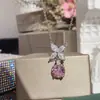 Versa joyería popular collar de tesoro retro colorido para mujer bañado en oro simulación diamante rosa mariposa Cuic colgante diario