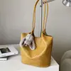 Bolso de hombro grande de verano 2026 para mujer, patrón tejido de nicho estilo coreano transfronterizo, elegante bolsa tote para ir al trabajo