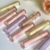 OULESONG té congelado espejo Brillo de labios Luz de agua miel de labios vidrio gelatina tubo redondo productos nacionales brillo de labios transmisión en vivo transfronteriza para mujeres