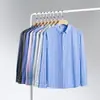 Camisa para Hombre Jiachuan de Cuatro Vías Elásticas Estampado Digital Rayas Manga Larga Cuello Solapa Tipo Camisa para Hombre Ropa para Hombre Venta al por Mayor