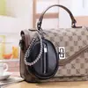 Nuevo Monedero de Muñeca de Cuero Genuino con Perla para Mujer Bolso de Almacenamiento de Moda de Primera Capa de Piel de Vaca Bolso para Labial Audífonos Bolso Colgante