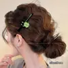 Lindo pasador de pelo de gatito negro, moderno y versátil para mujeres, perfecto para sujetar el flequillo y el cabello lateral, con un diseño de pinza de pico de pato de alta gama