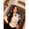 Camiseta de encaje con lazo estilo francés, cuello semi-alto, manga larga para mujer, Otoño e Invierno, color albaricoque, corte ajustado, suave top base
