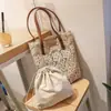 Bolsa de Palha Primavera/Verão 2026 Renda Vazada Bolsa de Praia Venda Quente Transfronteiriça Bolsa Feminina Estilo Praia