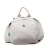 Bolsa de Tecido de Nylon para Mulheres Verão 2025 Novo Design de Nicho Bolsa Transversal Casual e Estilosa Versátil Bolsa Concha Bolsa para Celular