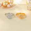 Anillo abierto de flor de circón giratorio nuevo transfronterizo diseño femenino sentido de diseño nicho anillo descompresión venta al por mayor