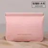 Bolsa de armazenamento com mola, bolsa de maquiagem para batom autotravante, absorvente higiênico, cabo de dados de fone de ouvido, porta-moedas, bolsa pequena portátil
