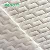 Suministro de fábrica tela textil para el hogar de poliéster primavera y verano blanco tela para el hogar textil cuero tejido de punto