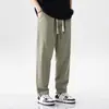 Pantalones de hombre color blanco roto, corte recto holgado, modernos y versátiles, pantalones casuales finos y transpirables para verano, ajuste cónico elástico, talla grande
