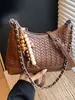 Bolsa Pequena Tecida Vintage Transfronteiriça para Mulheres, Versátil para Outono e Inverno 2026 Nova Bolsa de Ombro Transversal com Corrente Nicho Bolsa Bolinho