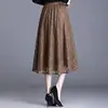 Falda Elástica con Encaje Hueco 2026 Otoño/Invierno Nueva de Cintura Alta Adelgazante de Longitud Media Elegante Falda de Línea A Acampanada