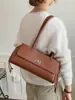 Bolsa de ombro acolchoada estilo Chanel, nova tendência primavera-verão 2026, bolsa baguette de luxo vintage, bolsa de mão para ombro para mulheres