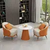Set sencillo y elegante de sofá individual y mesa de centro, adecuado para áreas de descanso, recepciones de hotel, oficinas de ventas y salas de reuniones
