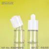 Botella gotero personalizada de 20 ml de pared gruesa para esencia, cabeza de goma redonda larga y corta, tubo de vidrio, para presionar líquido, botella vacía de plástico PET
