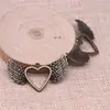 47x 29mm 4.5g comercio exterior AliExpress explosiones calientes colgante de corazón de amor alas de amor huecas