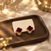 Aretes Geométricos Rojos Ankela Festivos de Año Nuevo Nicho Temperamento Venta Caliente Aretes de Botón Otoño/Invierno 2026 Venta al por Mayor de Pendientes