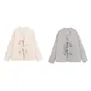 Exportación Transfronteriza Ropa de Mujer 2025 Otoño Estilo Europeo y Americano Cuello en V Manga Larga Con Cordones Longitud Media Chaqueta de Lana para Mujer B22578