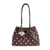 Bolso único de lunares para mujer, nuevo modelo 2026, bolso de hombro/cruzado simple y elegante, bolsa tote de gran capacidad para el trabajo