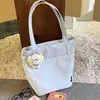 Bolsa tote de lona de alta qualidade e estilosa em estilo japonês, perfeita para o uso diário, com grande capacidade, adequada para estudantes e pessoas que se deslocam para o trabalho, e pode ser carregada como uma bolsa de ombro.