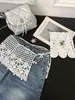 Falda de Encaje con Capas Florales Huecas con Cordones Combinada con Pantalones de Mezclilla, Moda de Verano Delgada Decorativa Adelgazante Media Falda para Mujer