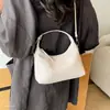 Bolso tejido de moda para mujer, diseño simple, nuevo modelo de gran capacidad 2026, bolso de hombro tipo cubo cruzado versátil de nicho para el día a día