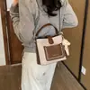 Bolso de mano pequeño de gamuza retro de alta gama para mujer, nuevo bolso de hombro de moda estilo coreano, bolso cruzado y bolso tipo cubo tote