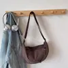 Bolsa Feminina Tendência 2026 Primavera Nova Bolsa de Lona Leve para o Trabalho Bolsa de Ombro Único Transversal Fashionable Bolsa Casual Dumpling