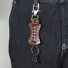Accesorios de Venta Caliente Transfronterizos, Llavero Personalizado y Creativo de Piel de Vaca con Remaches de Estrella, Colgante de Cintura para Hombre Estilo Punk Rock